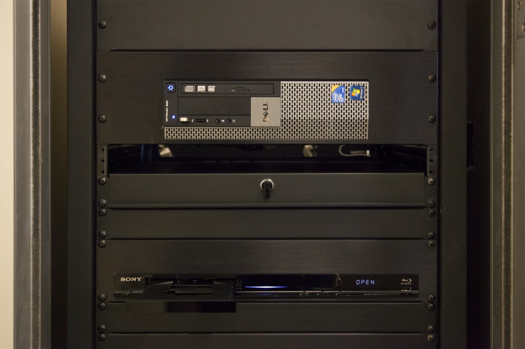 Closeup view of the computer and bluray player installed in the AV closet.