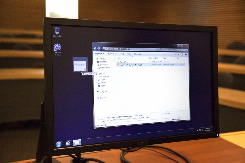 Photograph showing computer screen with File Explorer dialog box.