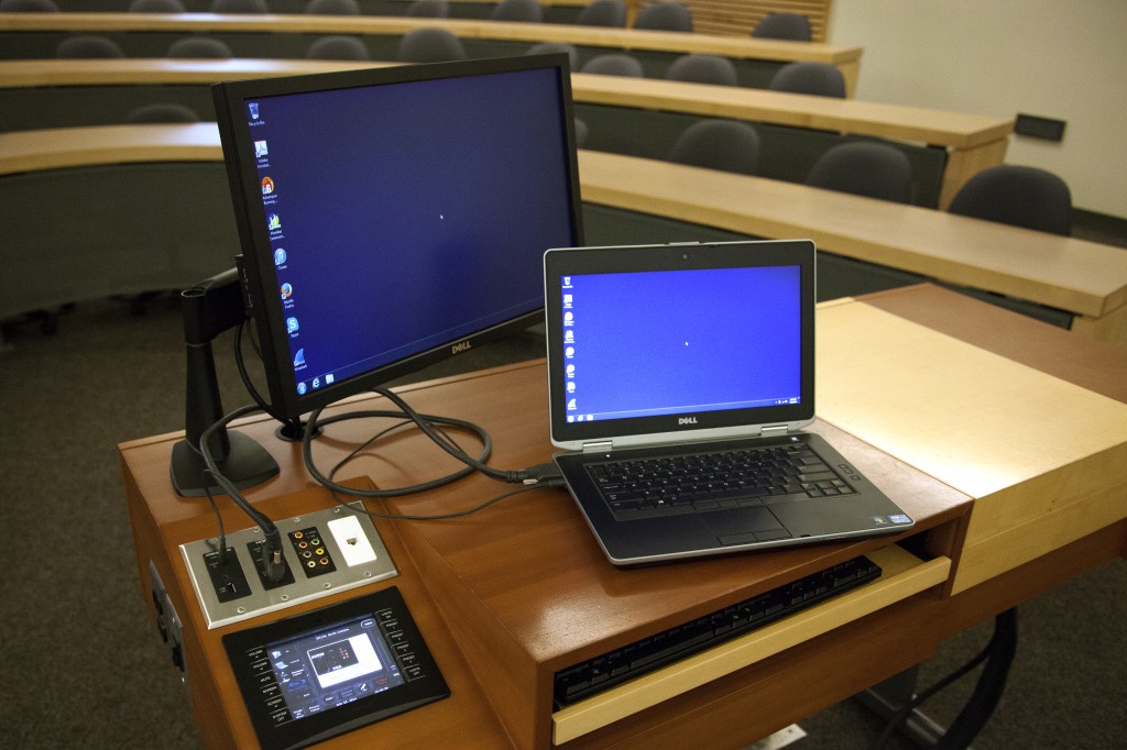 Photograph of a laptop connected to the classroom podium